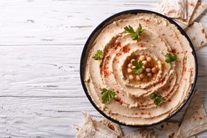Hummus is a healthy after-school snack with pita bread or fresh veggies.